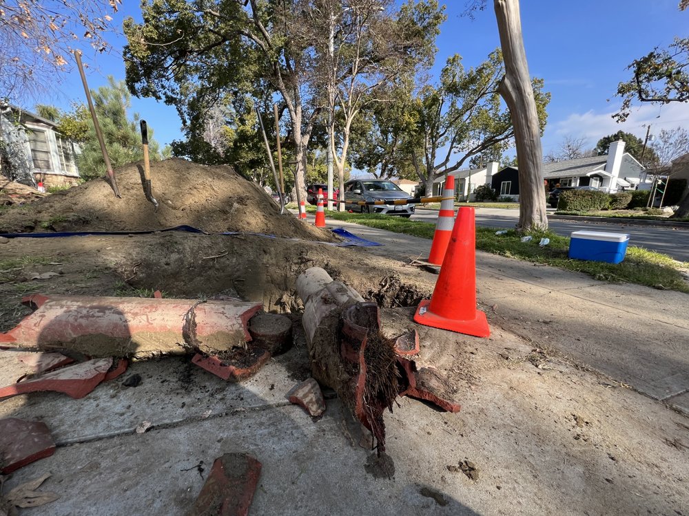 Root-crushed clay sewer line pulled and replaced in Glendale, CA